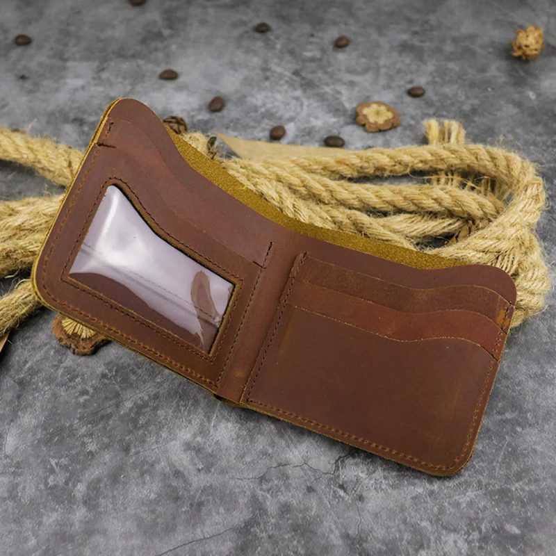 Slim brown leather card wallet with an ID window