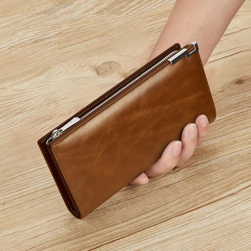 Brown cowhide long wallet held open