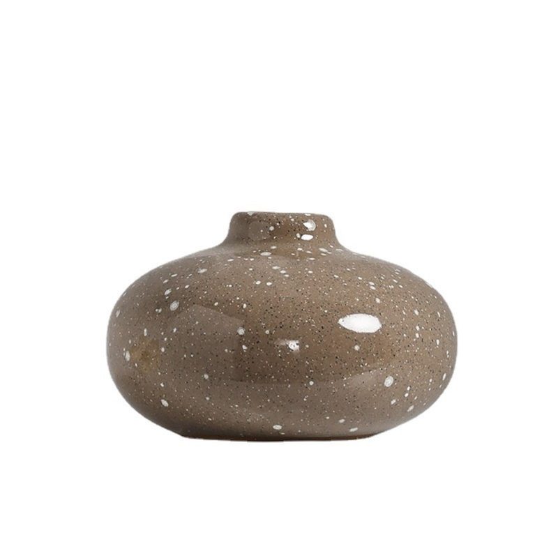 small round speckled ceramic bud vase