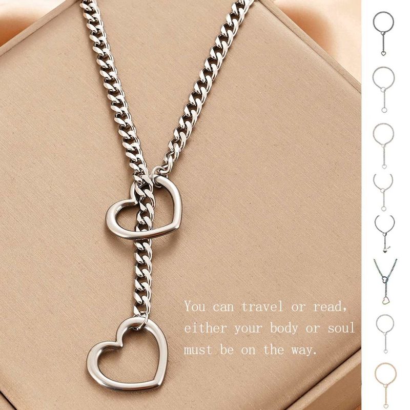 Silver lariat necklace with a small heart drop