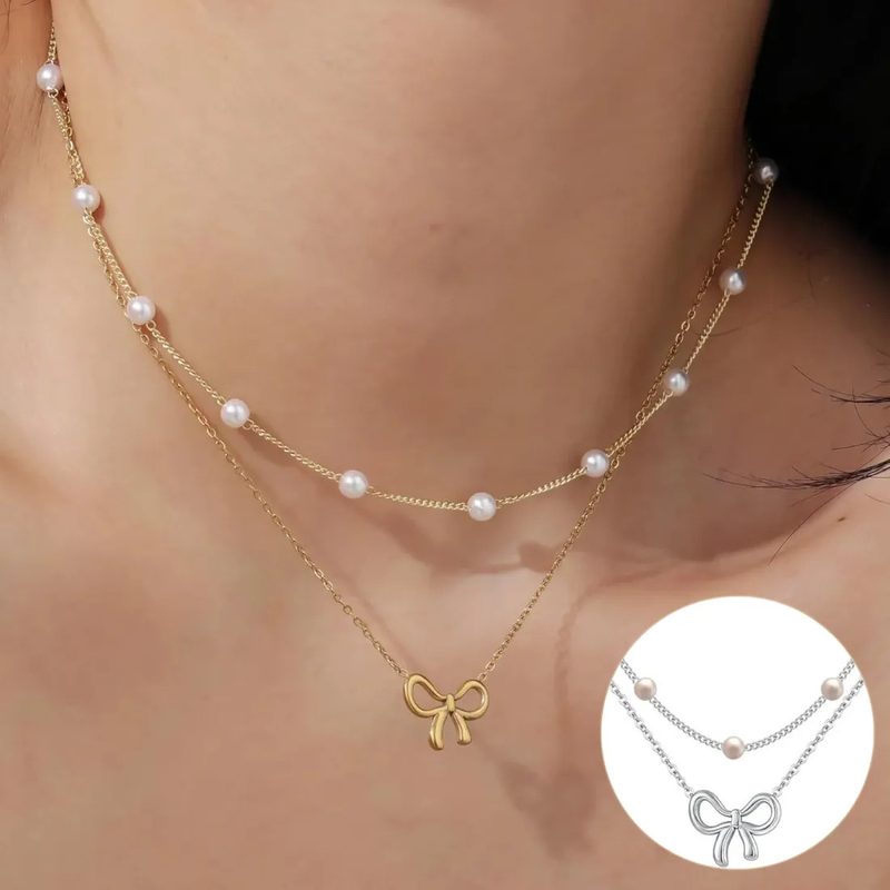 Two strand gold tone choker with small pearls