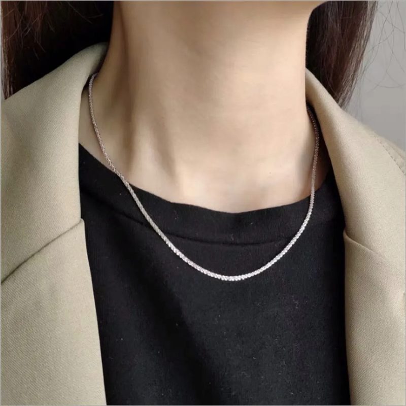 Fine silver-tone chain necklace with a subtle sparkle