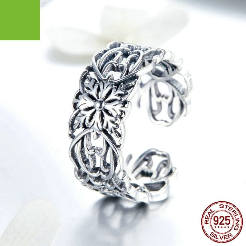 silver-tone vintage flower ring with raised detail