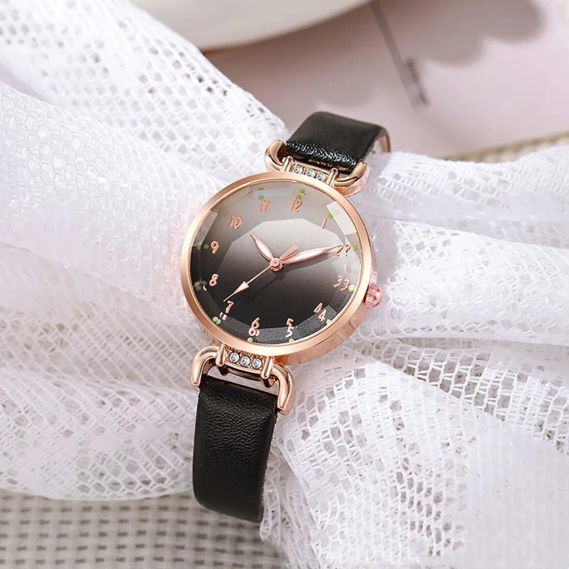 Petite rose-tone watch with a soft gradient numeral dial on a leather strap